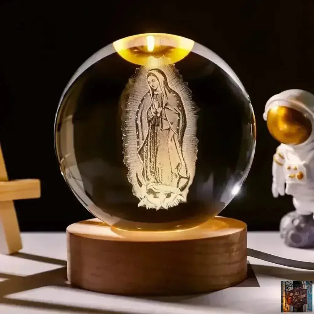 Boule de cristal illuminée - Jésus et Vierge Marie avec croix pour dévotion - © 2026 Le Grimoire Ancien