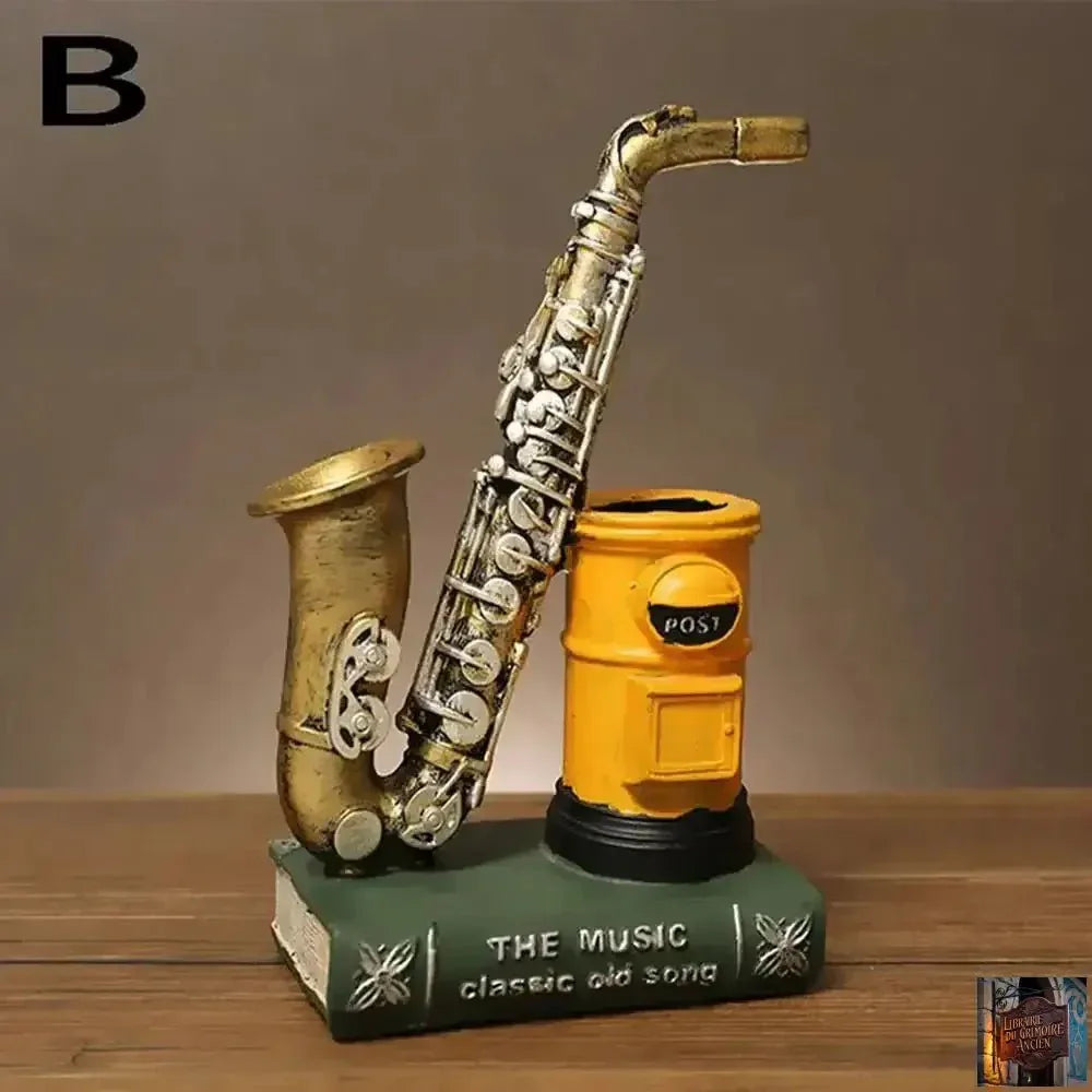 Porte-stylo artisanal en résine (saxophone & violon) - © 2026 Le Grimoire Ancien