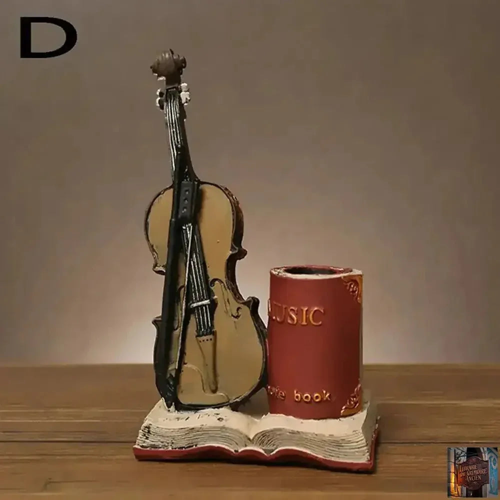 Porte-stylo artisanal en résine (saxophone & violon) - © 2026 Le Grimoire Ancien